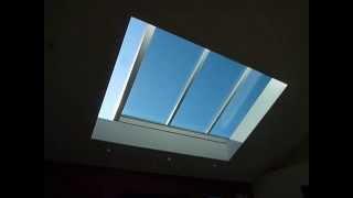 8-foot by 11-foot motorized retractable skylight