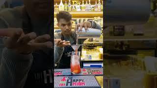 Indian Bartender Akash Jadhav with his floral cocktail