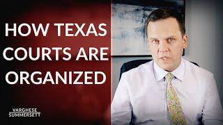 How is Texas' criminal court system structured?