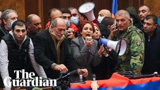 Armenian protesters storm government building after peace deal announced