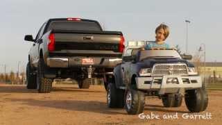 2014 Toyota Tundra vs Kid Trax Dodge Ram - Tug Of War!