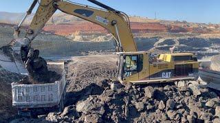 Caterpillar 365B Excavator Loading Mercedes & MAN Trucks