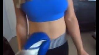 Man's boxing gloves vs woman's ab muscles