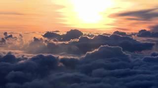 Sunrise Above The Clouds - Timelapse