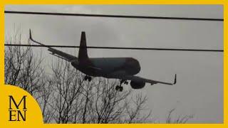 Pilots battle strong winds as they land at Manchester Airport