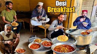 LOW PRICE PUNJABI STREET FOOD DESI BREAKFAST | BABA NASHTA POINT | BEST DESI CHEAP FOOD IN PAKISTAN