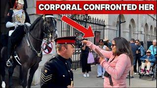 CORPORAL CONFRONTS A LADY WHO ANNOYS THE HORSE AND KING’S GUARD