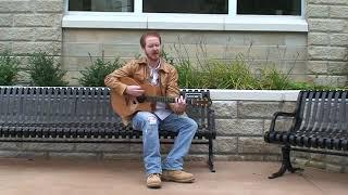 Danny Burns sings  Golden  on Floyd's Bench, Muskegon, MI