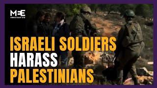 Journalist films Israeli soldiers preventing Palestinians from harvesting