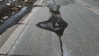 Michigan drivers brave pothole filled roads