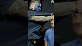  UFC FIGHTER TRIES TO RIP HIS T-SHIRT AND FAILS HORRIBLY