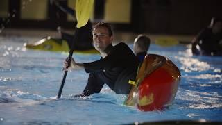 President Jon Levin paddles with the Stanford Kayak Club