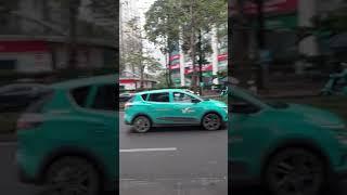 Electric cars in Vietnam. Green energy vehicles on roads