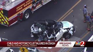 Child, motorcyclist injured in crash on Pine Hills Road, officials say