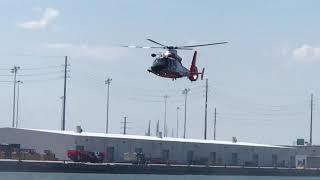 Coast Guard maneuvers over Charleston