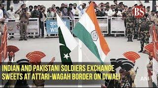 Indian and Pakistani soldiers exchange sweets at Attari-Wagah Border on Diwali