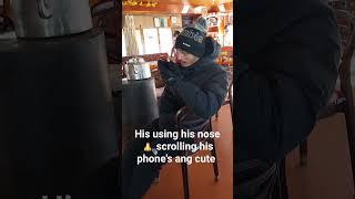 Advantage of having those pointed nose  at -15 degrees scrolling his phone using his nose