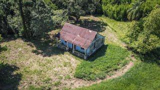 BEAUTIFUL ABANDONED HOUSE WITH KEY IN THE DOOR IN THE MIDDLE OF THE PLANTATION!