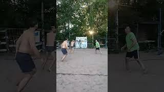 Beach volleyball, aggressive ball blocking.