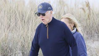 Joe Biden struggles to walk on sand during vacation in Delaware