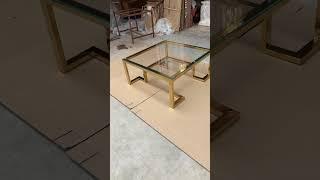 Stainless steel coffee table with glass