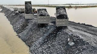 Excellent Technique of dumping Rock into Deep Water Perfectly To Build Road by Dump Trucks And Dozer