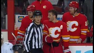 Matthew Tkachuk flies into Mark Giordano, ensuing a scrum