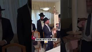 DANCING WITH A NEW TORAH