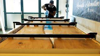 River Table made of elm wood and blue epoxy