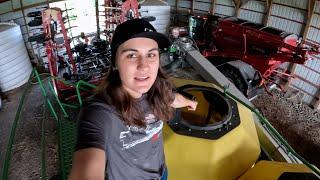 Laurel inspects a JD 1910 Red E Rebuild!