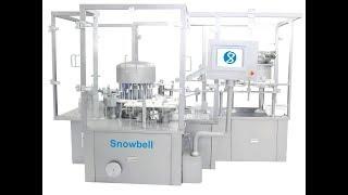 Snowbell - PFS   Filling, Stoppering with plunger Rod Insertion & Labelling Machine