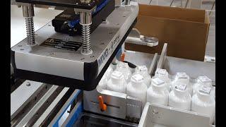 Vertical Robotic Case Packer for Bundles and Dual Robotic Palletizer