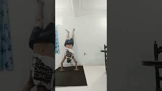 Kick up to handstand to wall or Handstand in general