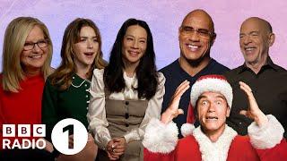 "I *know* this one!"  The Rock and the Red One cast take Ali Plumb's Christmas Movie Quiz