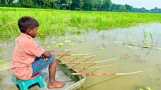 Unbelievable Technique Fishing || Smart Boy Catching Fish By Bamboo Hook In The Village Bill