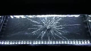 Uranium emitting radiation inside a cloud chamber