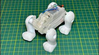 Quadruped Robot Dog with Realistic Walking Motion. Step-by-Step Assembly of a 4-Leg Mechanism