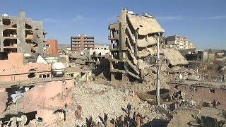 After partial lifting of curfew residents return to ruined Turkish city of Cizre