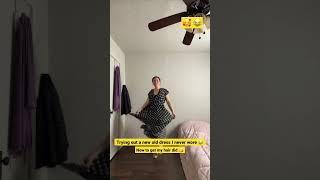 Trying on a dress  