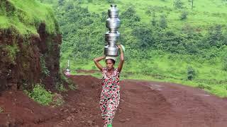 Balancing multiple pot act: Womenfolk fetch water from village water source in rural Maharashtra