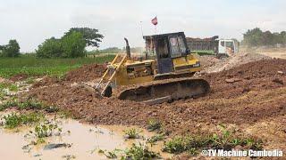 Best Komatsu Bulldozer D58P Operating Pushing Off Dirt, Dumping a Load Of Dirt Truck