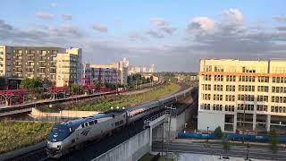 Amtrak train with Charlotte skyline #cities #trains #travel