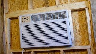 Our Tiny House Adventure: Installing the A/C into the wall.