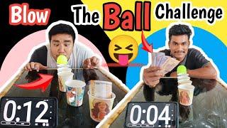 Blow the ball over glass challenge