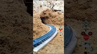 Oil Tanker Train Passing Through a Miniature Tunnel