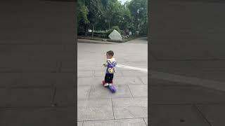 Riding scooter by a two year old boy #sports #scooter