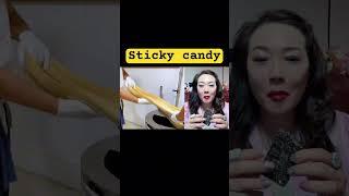 Jenny likes China street food: Sticky candy with sesames!Jenny eating show! Chinese Asian snacks!