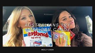 Australians try American candy ft Mejuri haul