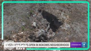 Mysterious holes open in Nokomis neighborhood