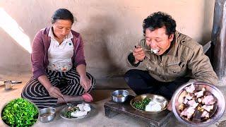 Sharmila  cooking pork & mustard greens curry for lunch